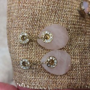 Pink stone-like earrings with rhinestones